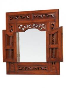 Wooden mirror with carved panels