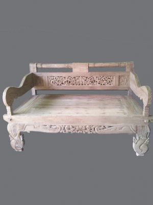 Ornate carved wooden daybed