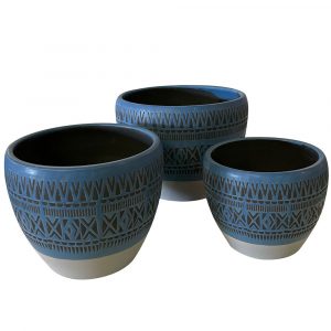 Three blue ceramic bowls with rim pattern