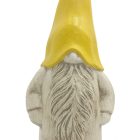 Gnome figurine with yellow hat facing away